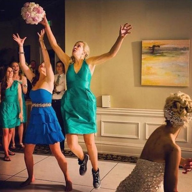 12 People Who Tried Way, Way Too Hard To Catch The Bouquet At A Wedding