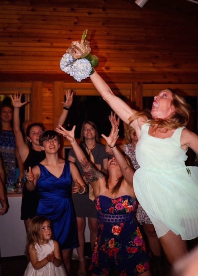 12 People Who Tried Way, Way Too Hard To Catch The Bouquet At A Wedding