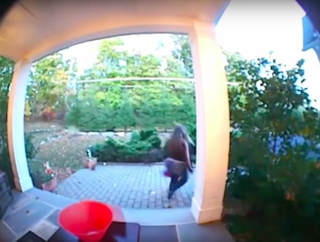 Woman Caught On Camera Stealing Bowl Of Halloween Candy