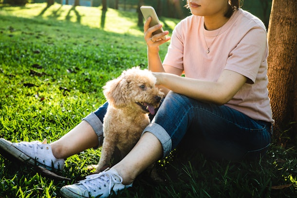 Woman reading text from person who ghosted her