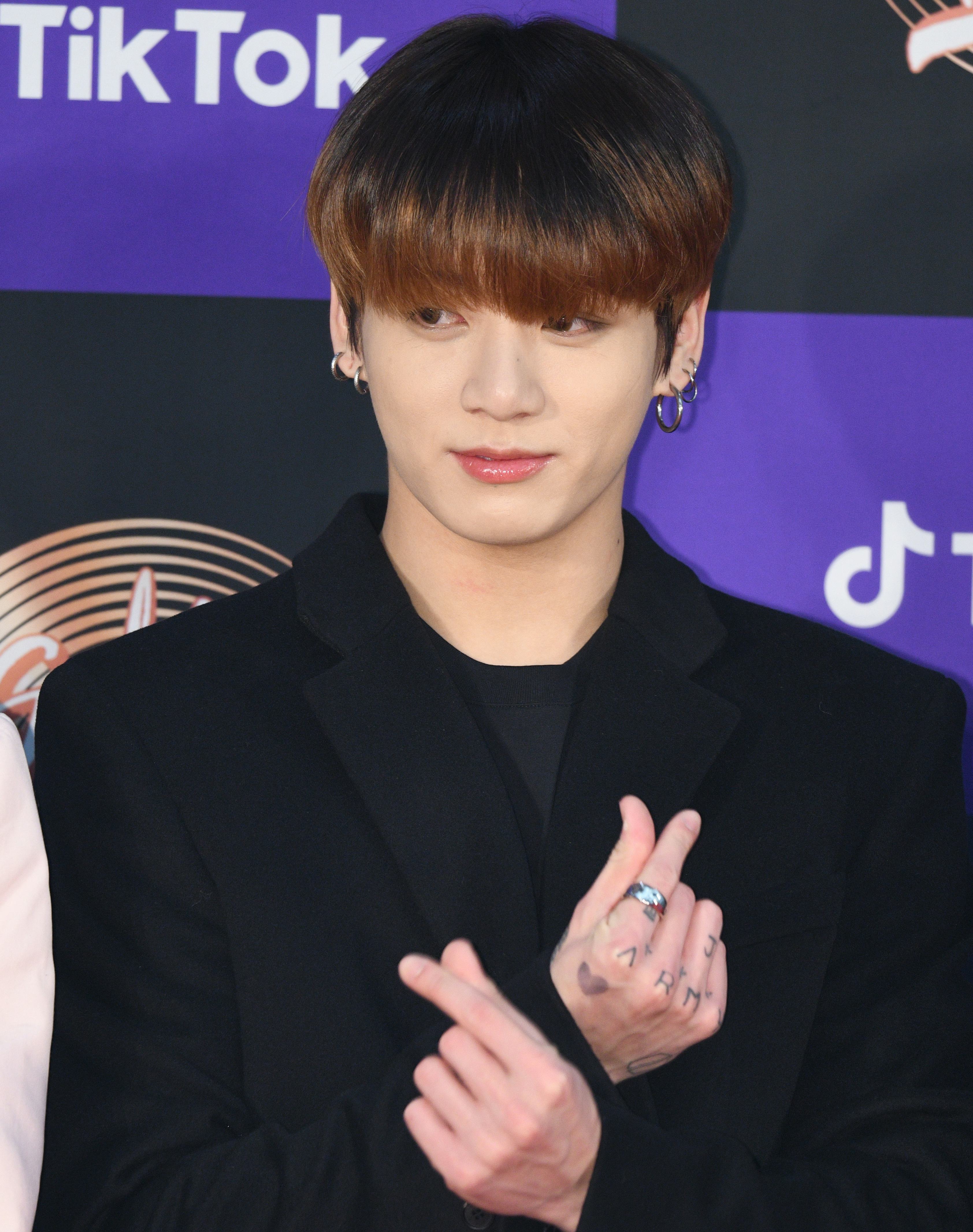 How Many Tattoos Does BTS' Jungkook Have? Here's A Comprehensive List