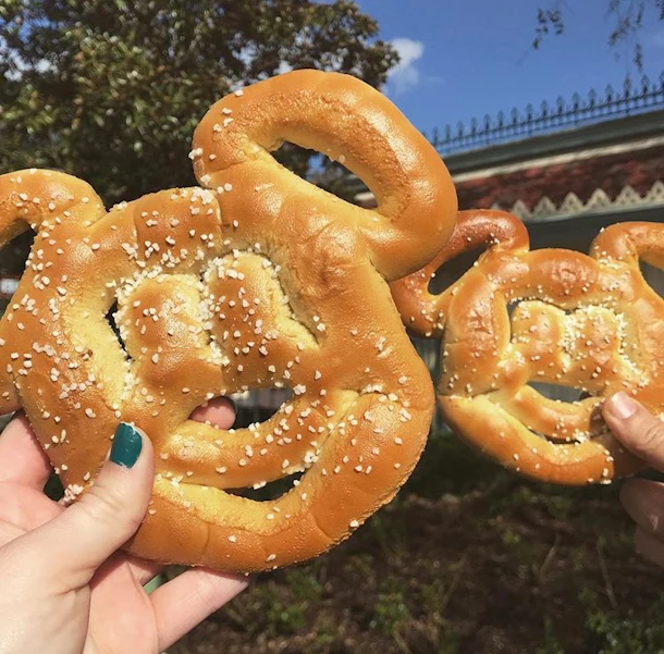A Mickey pretzel is one of the Mickey-shaped foods at Disney that's a must-try. 