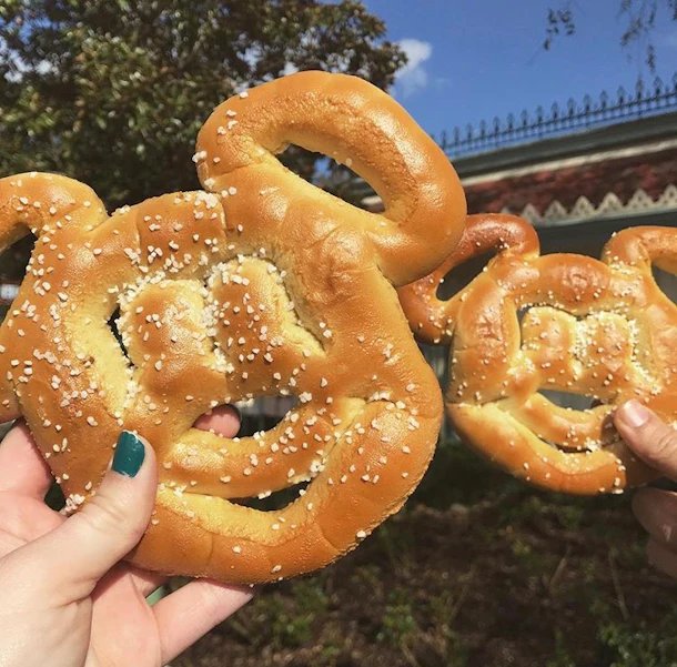 A Mickey pretzel is one of the Mickey-shaped foods at Disney that's a must-try.