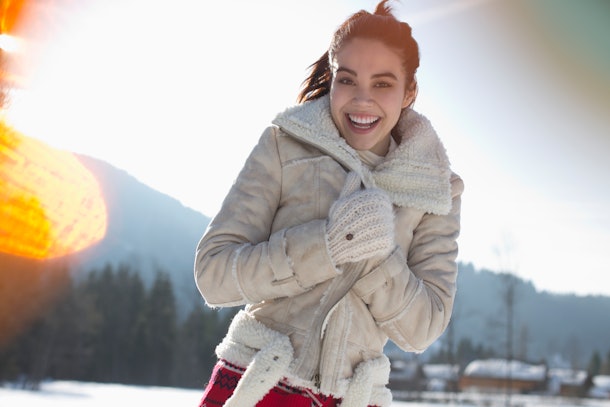 Woman on snowy mountain during winter solstice 2019