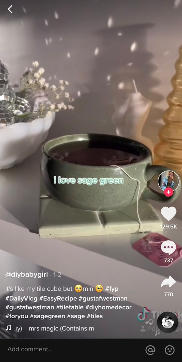 A TikTok user crafts their own sage-colored coasters with tiling and paint.