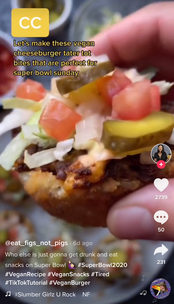 A woman holds up a vegan cheeseburger tater tot bite with lettuce, tomatoes, and pickles in this TikToker's Super Bowl snack recipe.