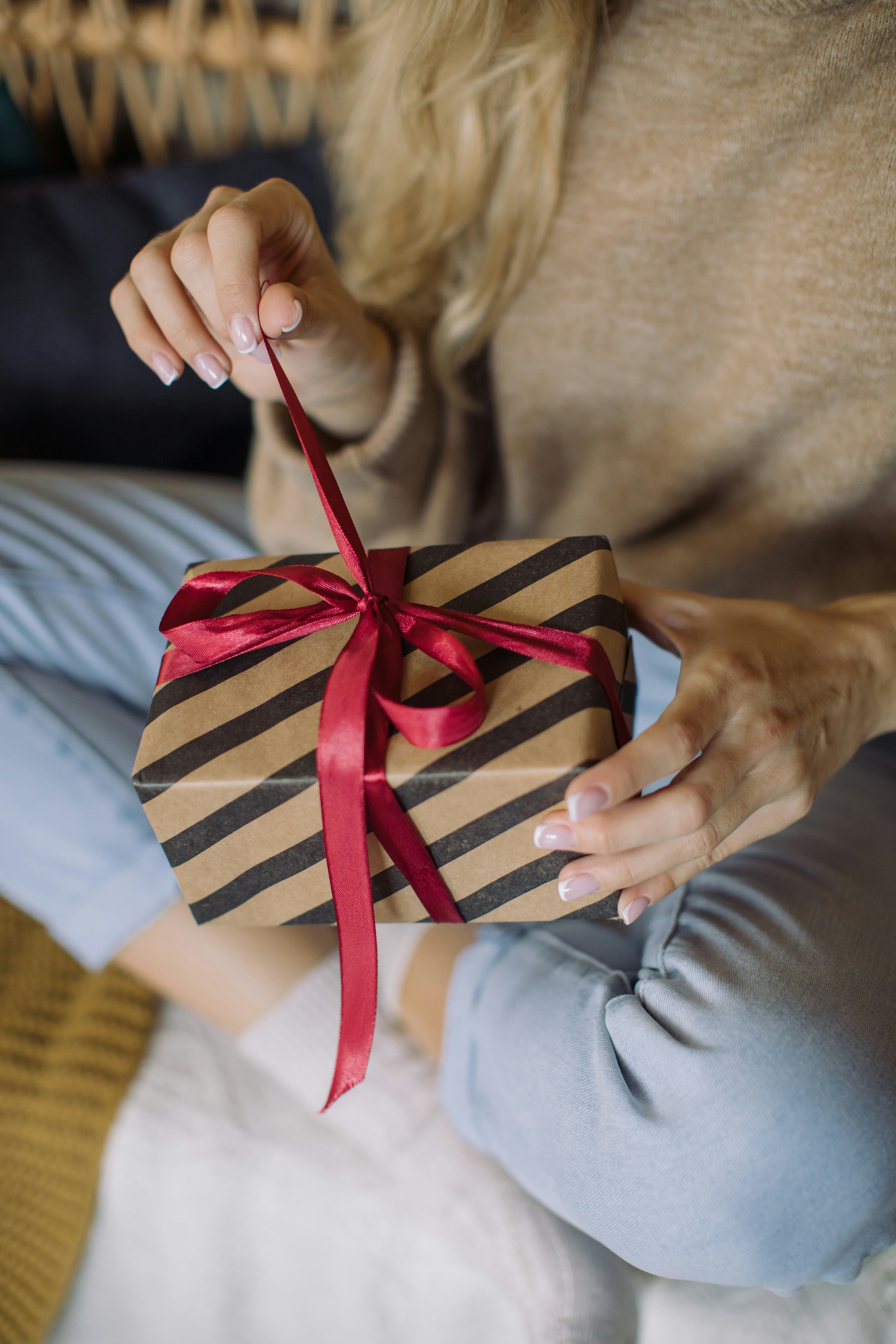 28 Clever Gift Captions For Wrapping Up The Holidays On Your Feed