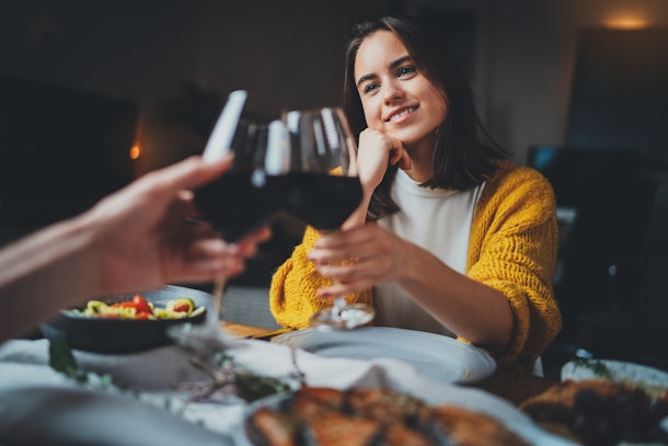 Searching for Instagram photo ideas for at-home date nights? Your clinking glasses is an easy, fun option.